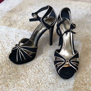 Coach Daylan black and gold heels
